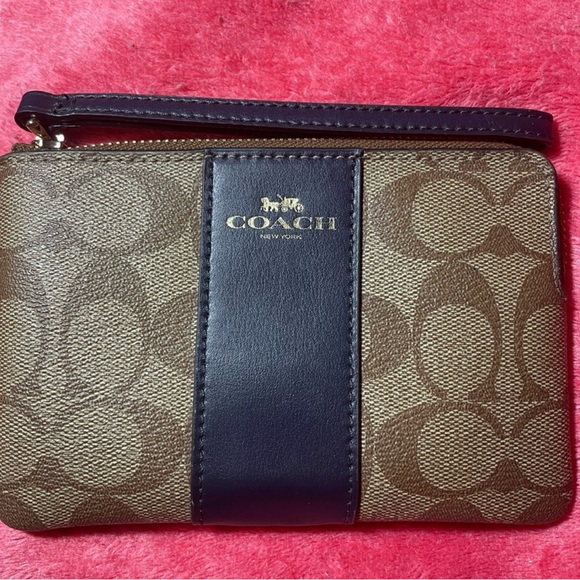Coach Handbags - Coach Wristlet Signature Center Stripe